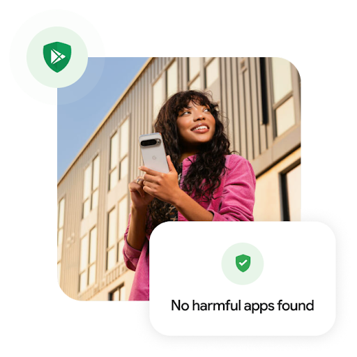 A person wearing jeans with a leopard-print shirt underneath a pink corduroy jacket holds a Pixel phone while looking to the side. A building is in the background