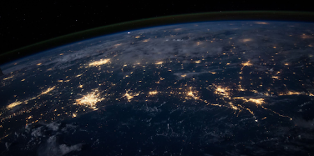 Cities lighting up the globe from space at night