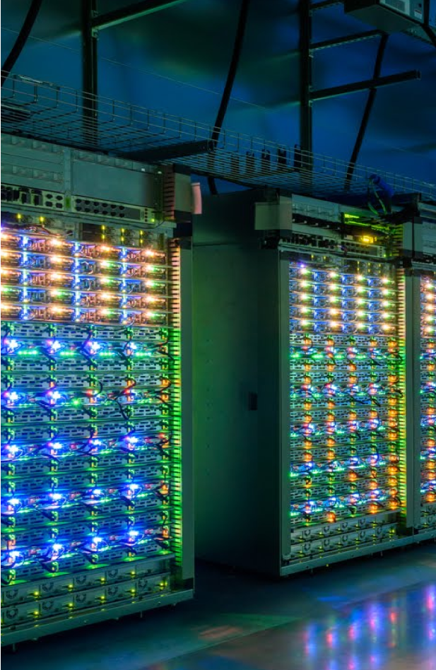 Inside of a data centre with lit-up data servers