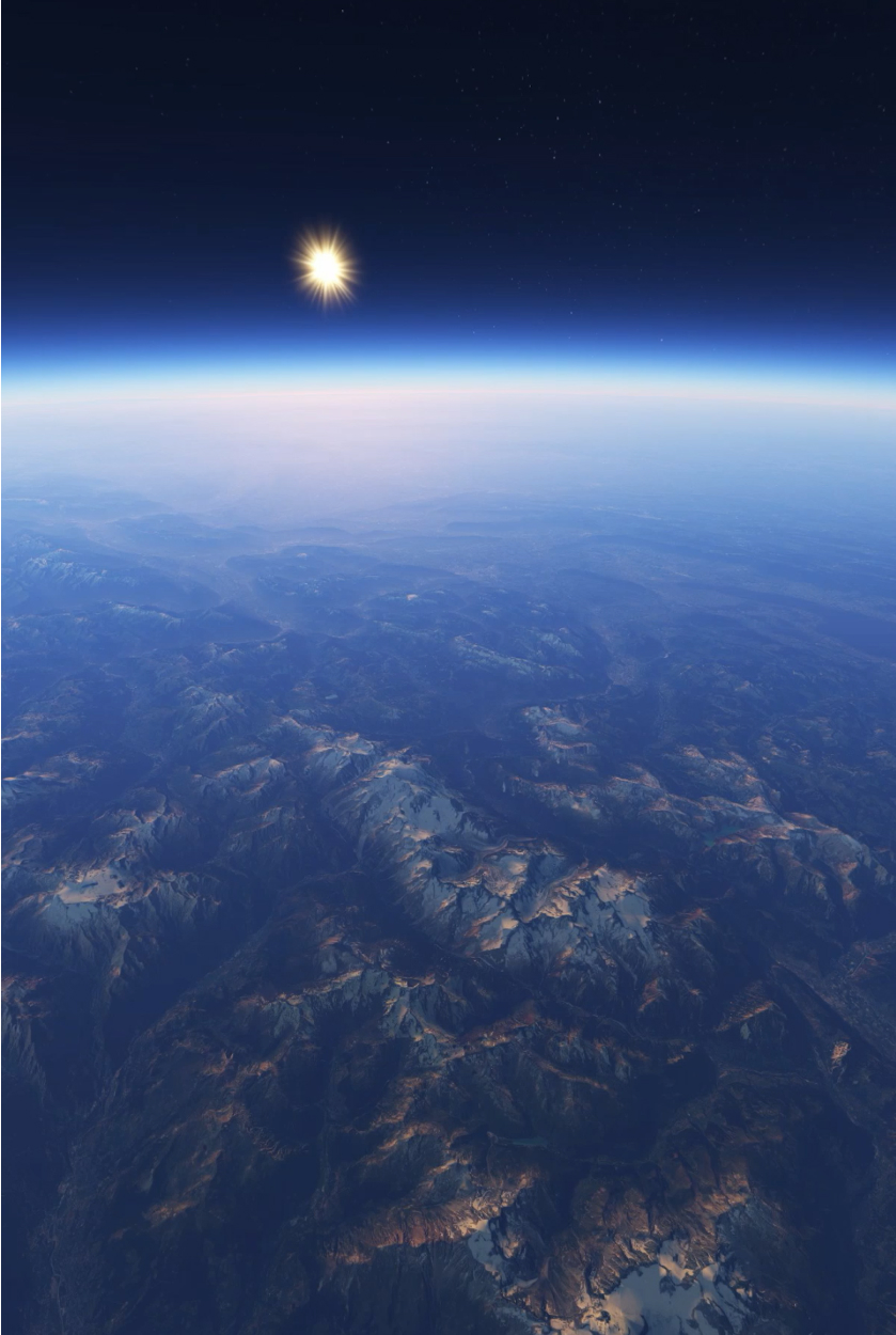 Aerial satellite view of Earth’s surface, showing a mountainous landscape.