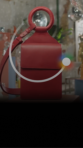 An image of a red bag is used as an example for how Circle to search works.