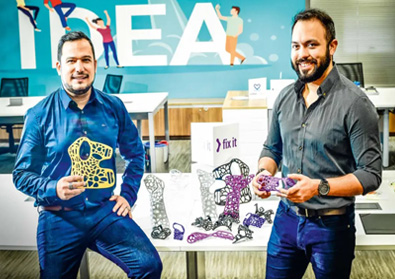 FixIt founders Felipe Neves and Hebert Costa with FixIt prosthetics